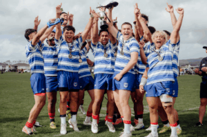 Auckland Rugby League boys team lift trophy